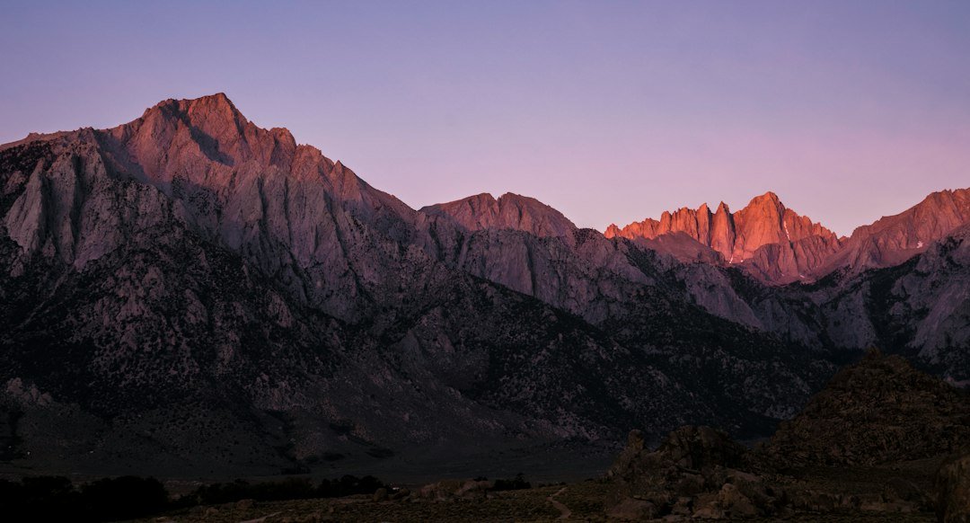 Sunrise illuminating rugged Sierra Nevada peaks in California
